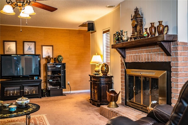 4101 N Forbes Rd, Plant City, FL 33565 - living room featuring carpet, ceiling fan, and a fireplace