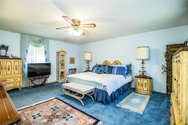 4101 N Forbes Rd, Plant City, FL 33565 - carpeted bedroom featuring a ceiling fan and a textured ceiling