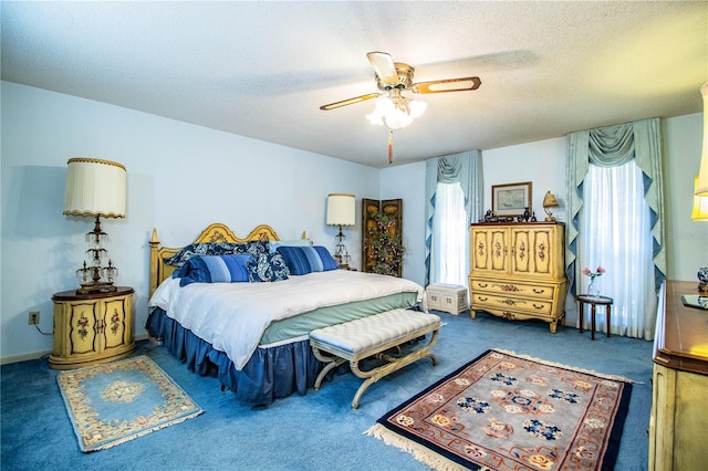 4101 N Forbes Rd, Plant City, FL 33565 - carpeted bedroom featuring a textured ceiling and ceiling fan