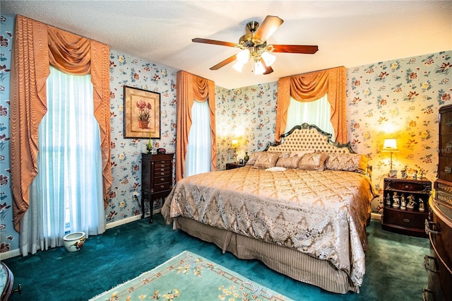 4101 N Forbes Rd, Plant City, FL 33565 - carpeted bedroom featuring wallpapered walls, a ceiling fan, and baseboards