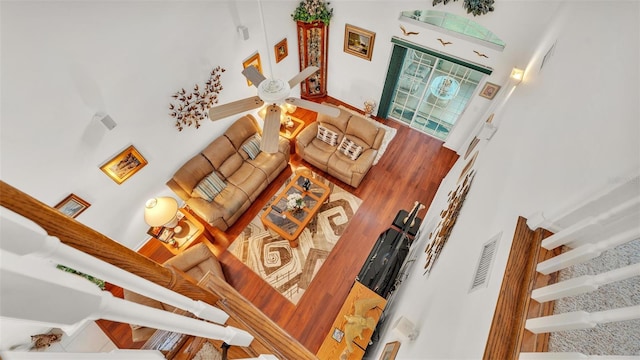 1062 Rally Dr, Polk City, FL 33868 - stairs featuring wood finished floors and visible vents