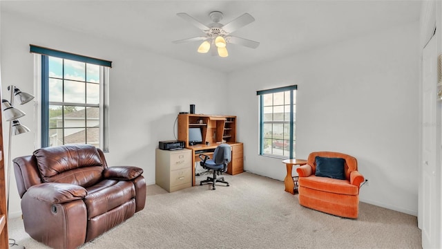 1062 Rally Dr, Polk City, FL 33868 - carpeted home office with ceiling fan and plenty of natural light