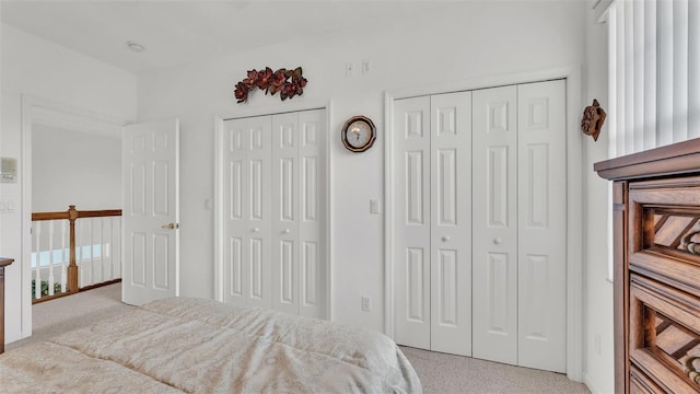 1062 Rally Dr, Polk City, FL 33868 - carpeted bedroom with multiple closets