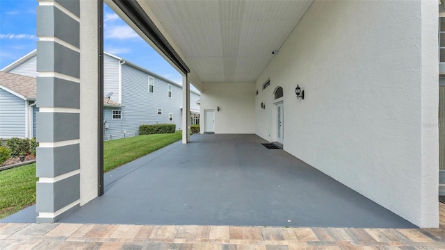 1062 Rally Dr, Polk City, FL 33868 - view of patio / terrace with an attached carport