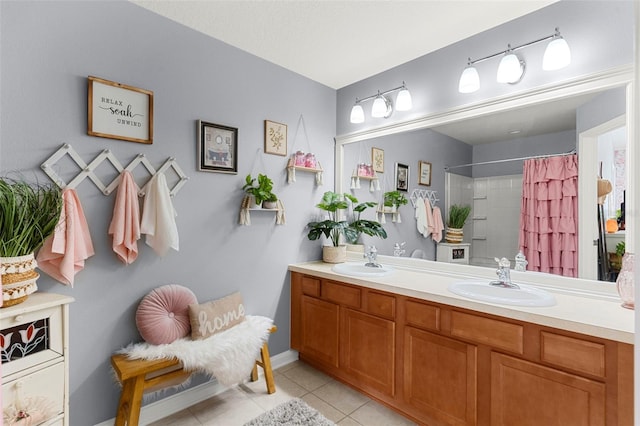 2125 Wild Grape Pl, Riverview, FL 33578 - bathroom featuring tile patterned flooring, double vanity, and a shower with curtain