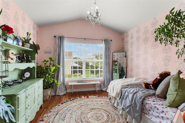 2125 Wild Grape Pl, Riverview, FL 33578 - bedroom with a chandelier, wood finished floors, and vaulted ceiling