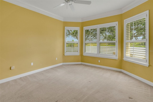 unfurnished room with light carpet, a ceiling fan, and a healthy amount of sunlight