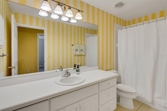 full bathroom with visible vents, tile patterned floors, vanity, and toilet