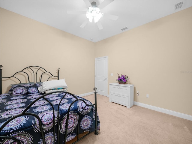 3300 Hawks Ridge Dr, Lakeland, FL 33810 - bedroom with light colored carpet, baseboards, and ceiling fan