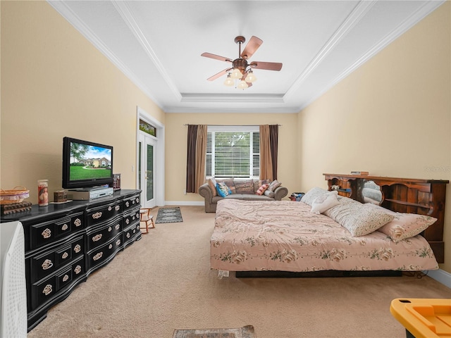 3300 Hawks Ridge Dr, Lakeland, FL 33810 - bedroom featuring carpet floors, crown molding, access to exterior, a tray ceiling, and ceiling fan