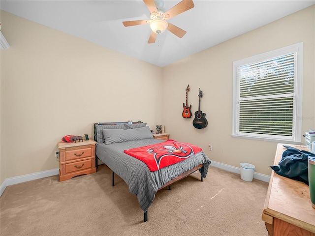 3300 Hawks Ridge Dr, Lakeland, FL 33810 - bedroom with light colored carpet, baseboards, and ceiling fan