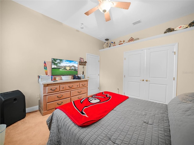 3300 Hawks Ridge Dr, Lakeland, FL 33810 - bedroom with light carpet, a ceiling fan, a closet, and baseboards