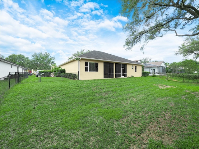 3300 Hawks Ridge Dr, Lakeland, FL 33810 - rear view of property with a sunroom and stucco siding