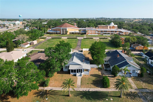 birds eye view of property with a residential view