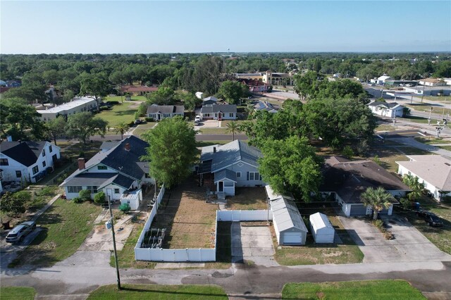 birds eye view of property with a residential view