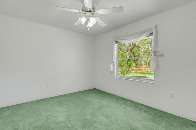 12301 Jim Edwards Rd, Haines City, FL 33844 - empty room with carpet flooring, baseboards, and ceiling fan