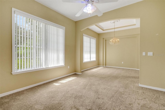12301 Jim Edwards Rd, Haines City, FL 33844 - carpeted spare room featuring plenty of natural light, arched walkways, and a ceiling fan