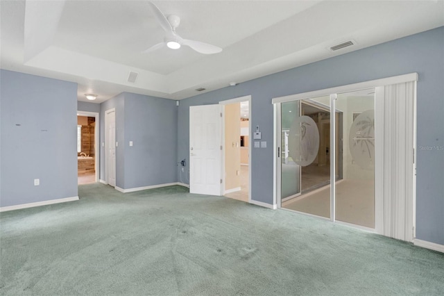 12301 Jim Edwards Rd, Haines City, FL 33844 - unfurnished bedroom featuring carpet flooring, baseboards, ensuite bathroom, and a ceiling fan