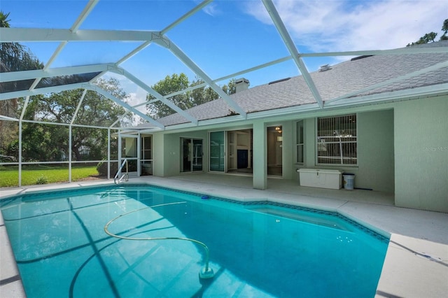 12301 Jim Edwards Rd, Haines City, FL 33844 - swimming pool with a patio area and glass enclosure