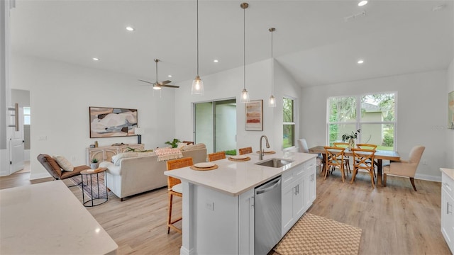 505 Shanklin Ave, Bartow, FL 33830 - kitchen featuring dishwasher, white cabinets, open floor plan, light countertops, and recessed lighting