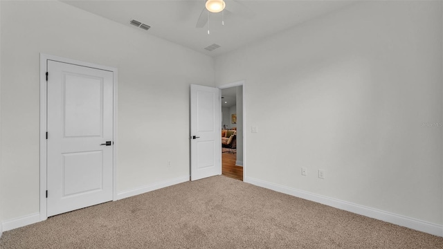 505 Shanklin Ave, Bartow, FL 33830 - unfurnished bedroom featuring carpet and ceiling fan