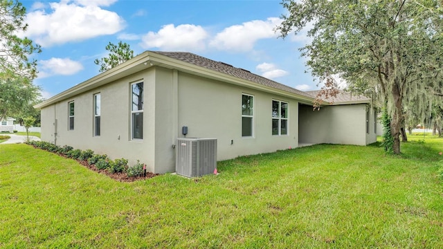 505 Shanklin Ave, Bartow, FL 33830 - rear view of property featuring stucco siding and a yard