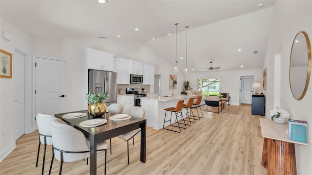 803 Allison Pl, Bartow, FL 33830 - dining space with light wood-style floors, a ceiling fan, recessed lighting, and high vaulted ceiling
