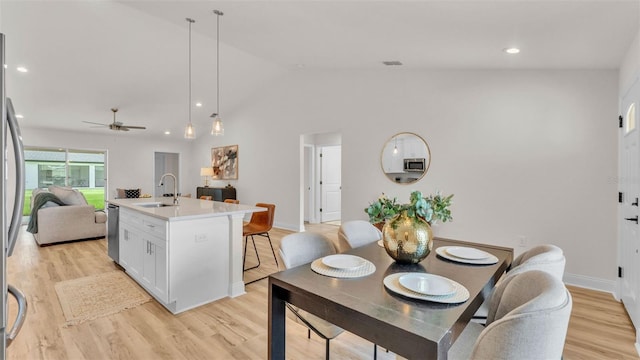 803 Allison Pl, Bartow, FL 33830 - dining area with lofted ceiling, ceiling fan, light wood finished floors, and recessed lighting