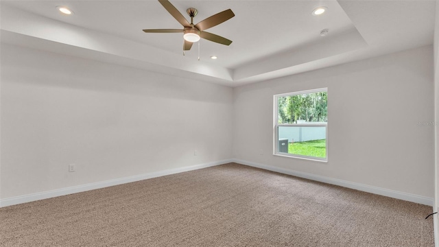 803 Allison Pl, Bartow, FL 33830 - carpeted empty room featuring recessed lighting, a tray ceiling, and a ceiling fan
