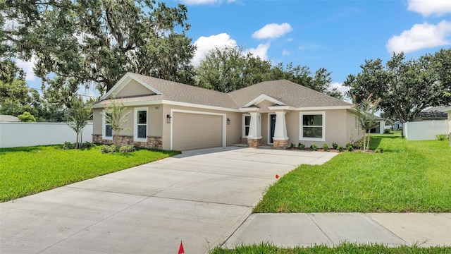 803 Allison Pl, Bartow, FL 33830 - view of front of house featuring stucco siding, an attached garage, concrete driveway, stone siding, and roof with shingles