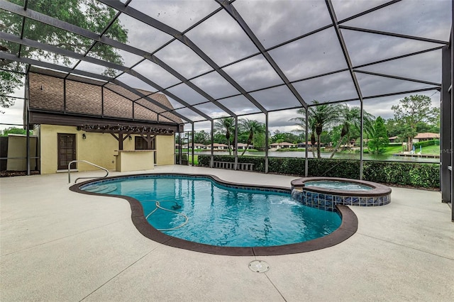 3906 Canyon Lake Pt, Lakeland, FL 33813 - view of swimming pool featuring a pool with connected hot tub, a lanai, and a patio