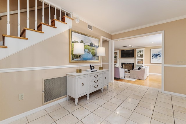 3906 Canyon Lake Pt, Lakeland, FL 33813 - corridor with crown molding, stairs, light tile patterned floors, and visible vents