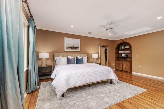 3906 Canyon Lake Pt, Lakeland, FL 33813 - bedroom with wood finished floors, baseboards, ornamental molding, and recessed lighting