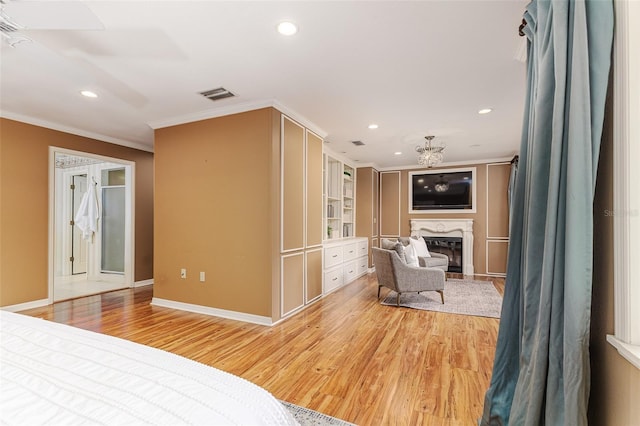 3906 Canyon Lake Pt, Lakeland, FL 33813 - bedroom with light wood-style floors, crown molding, baseboards, and recessed lighting