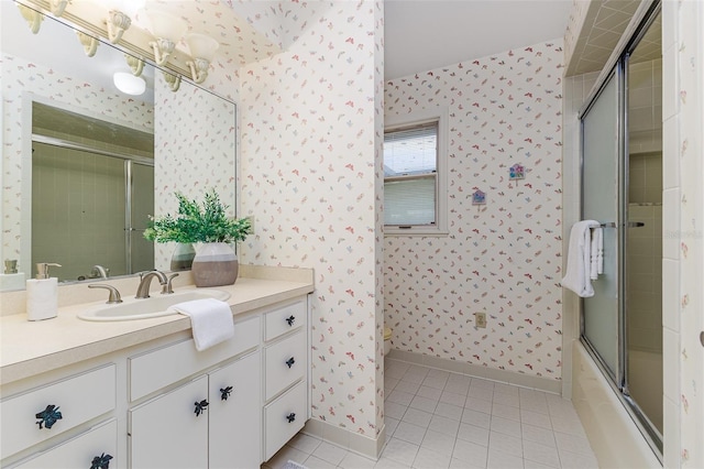 3906 Canyon Lake Pt, Lakeland, FL 33813 - full bath featuring toilet, vanity, tile patterned floors, baseboards, and wallpapered walls