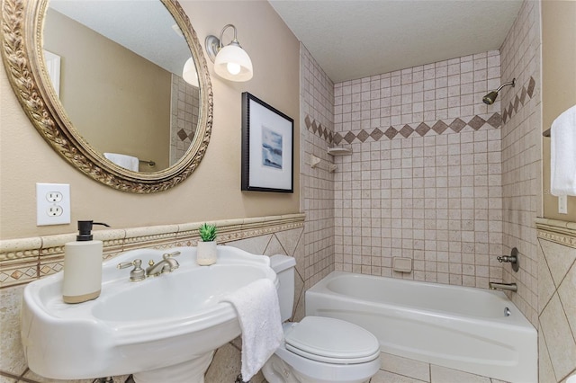3906 Canyon Lake Pt, Lakeland, FL 33813 - full bath with a sink, tub / shower combination, tile walls, and toilet