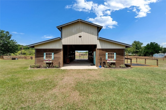 9004 Selph Rd, Lakeland, FL 33810 - rear view of house with an outbuilding, a barn, and a yard