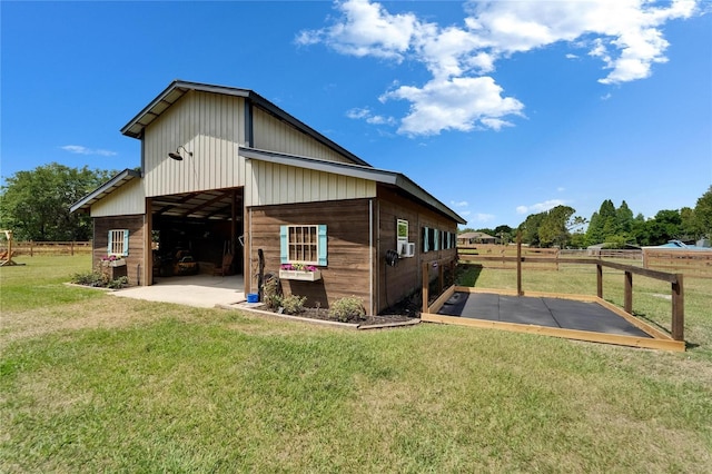 9004 Selph Rd, Lakeland, FL 33810 - rear view of property with a yard, fence, and an outbuilding