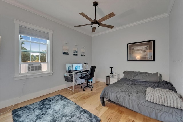9004 Selph Rd, Lakeland, FL 33810 - bedroom with baseboards, ornamental molding, cooling unit, ceiling fan, and wood finished floors