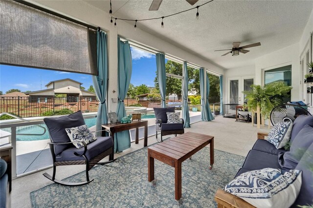 9004 Selph Rd, Lakeland, FL 33810 - sunroom / solarium featuring french doors and a textured ceiling