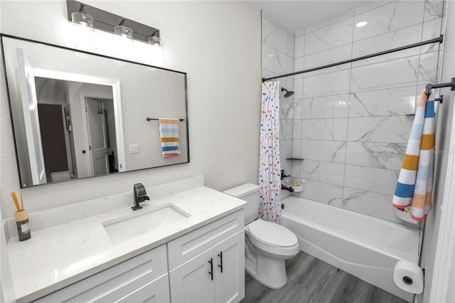 full bathroom with shower / bath combo, toilet, vanity, and wood finished floors