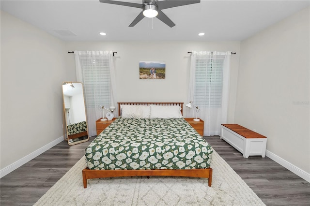 bedroom featuring recessed lighting, dark wood-type flooring, baseboards, and a ceiling fan