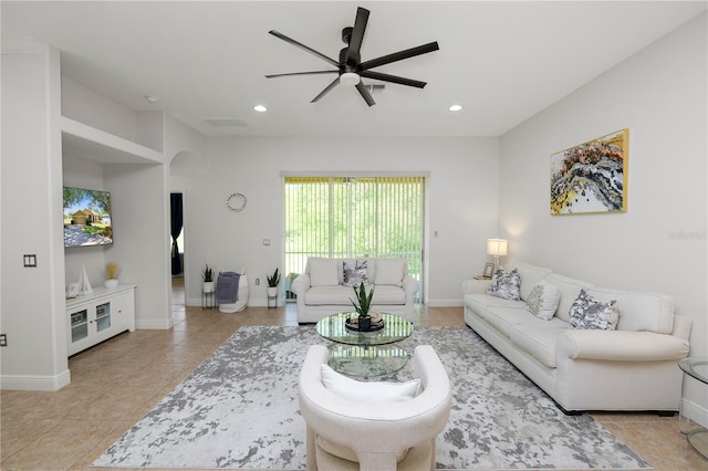 living room with ceiling fan, light tile patterned floors, recessed lighting, and baseboards