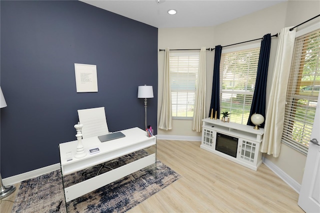 office area with baseboards, wood finished floors, plenty of natural light, and recessed lighting