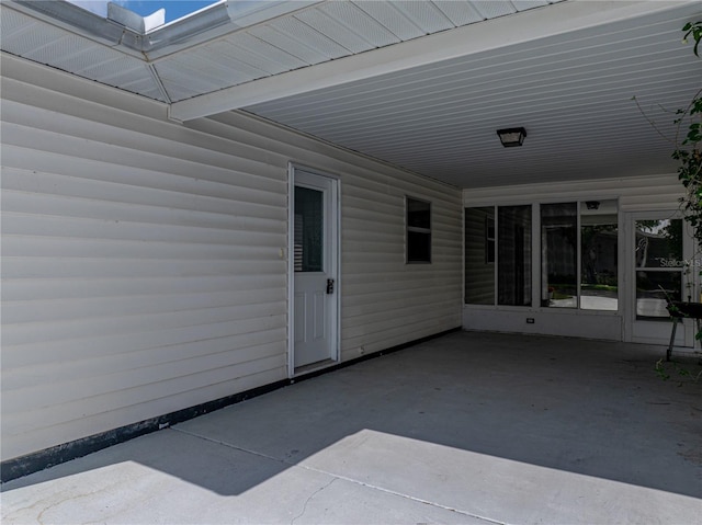 view of patio / terrace featuring a carport