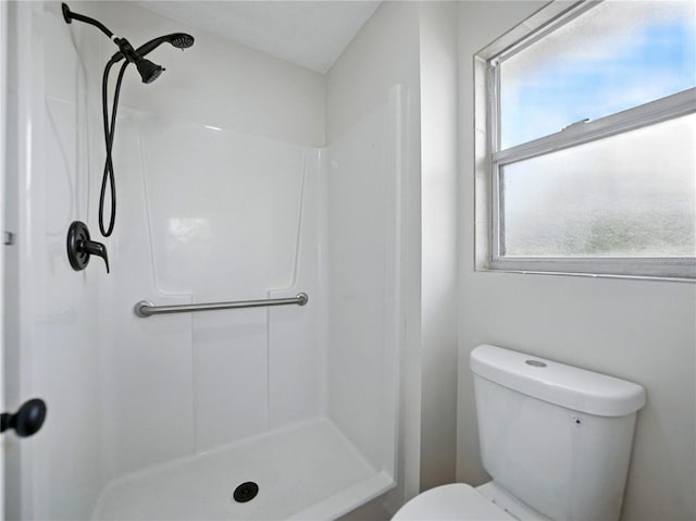 full bath featuring walk in shower and toilet