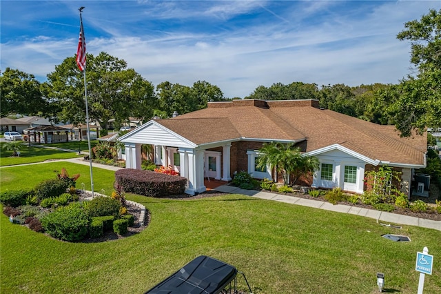 view of front of property with a front yard