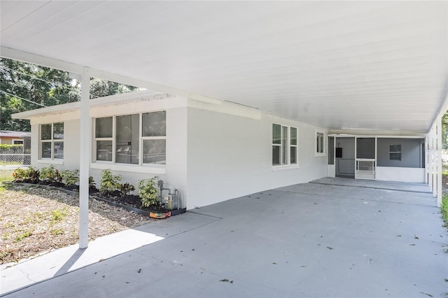 view of patio / terrace with a carport