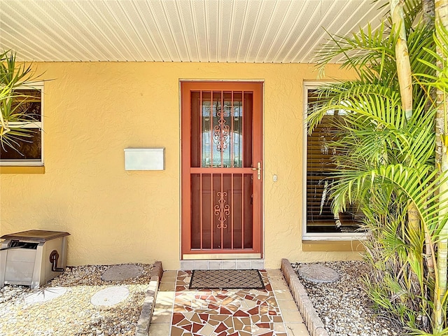 4921 Marlin Dr, New Port Richey, FL 34652 - property entrance featuring stucco siding