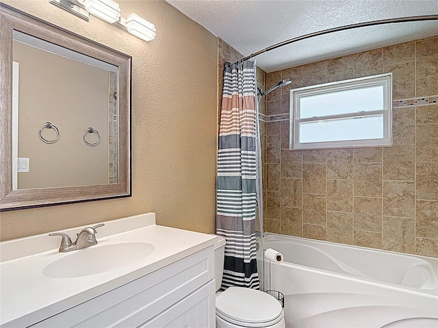 4921 Marlin Dr, New Port Richey, FL 34652 - full bathroom with a textured ceiling, vanity, toilet, shower / tub combo, and a textured wall